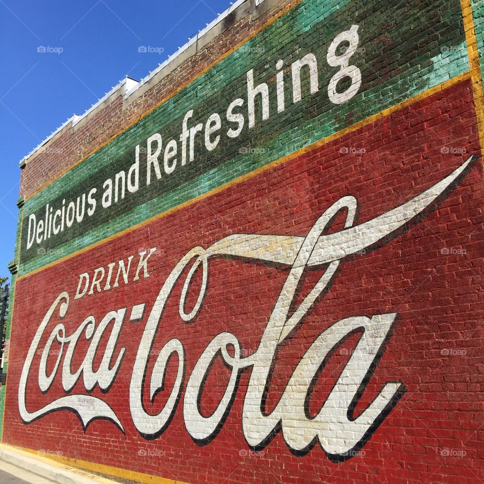 Coca Cola advertisement sign on building