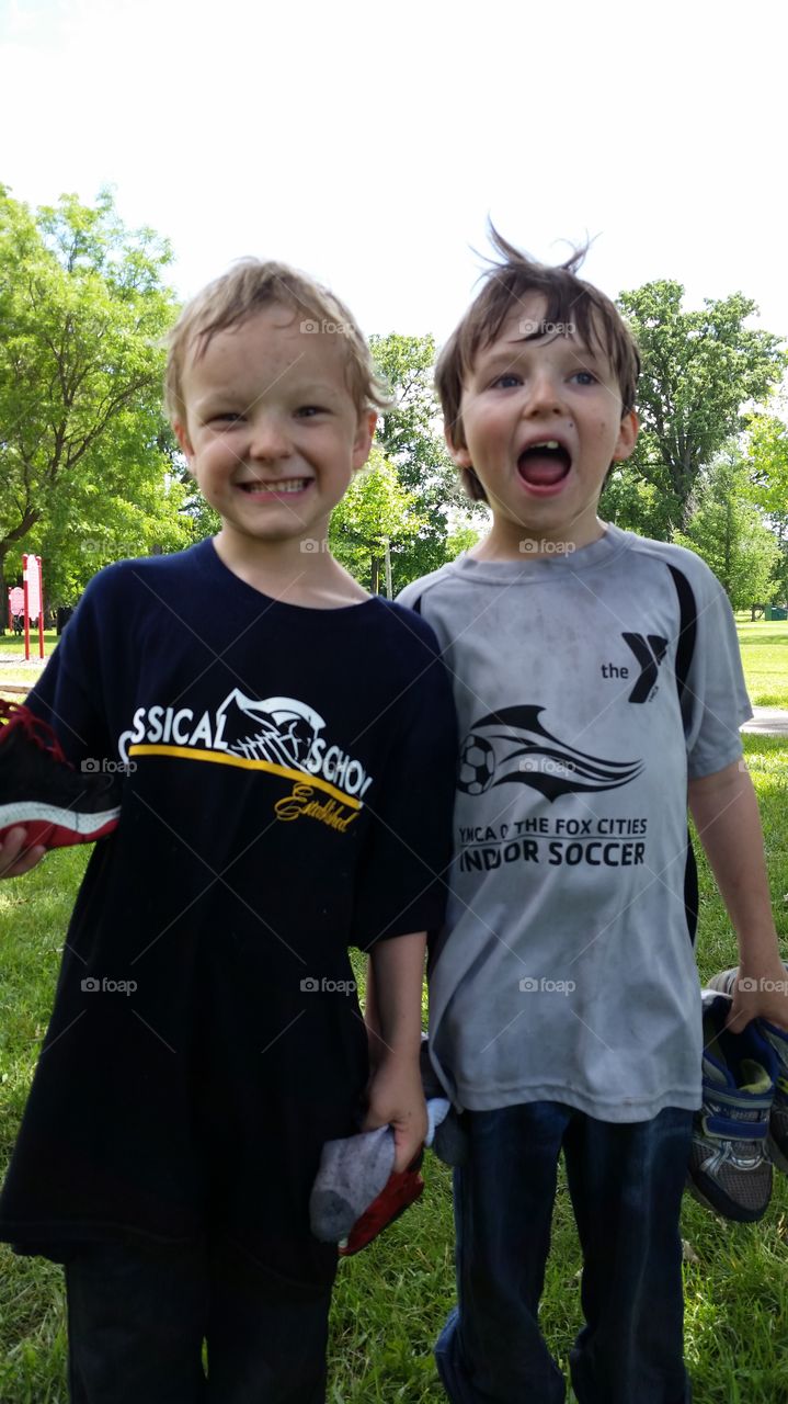 Mud Buddies. The aftermath of playing in the mud puddles.