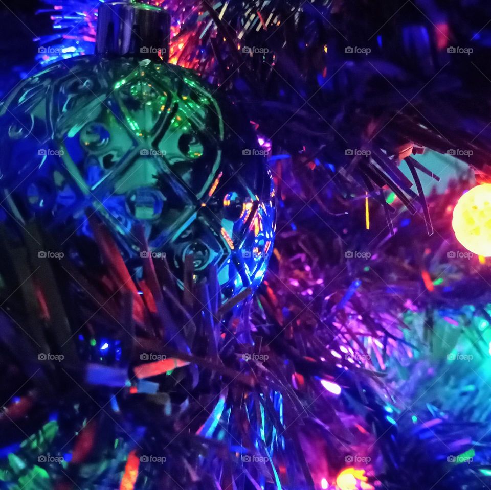 A Christmas ornament hanging from a tree
