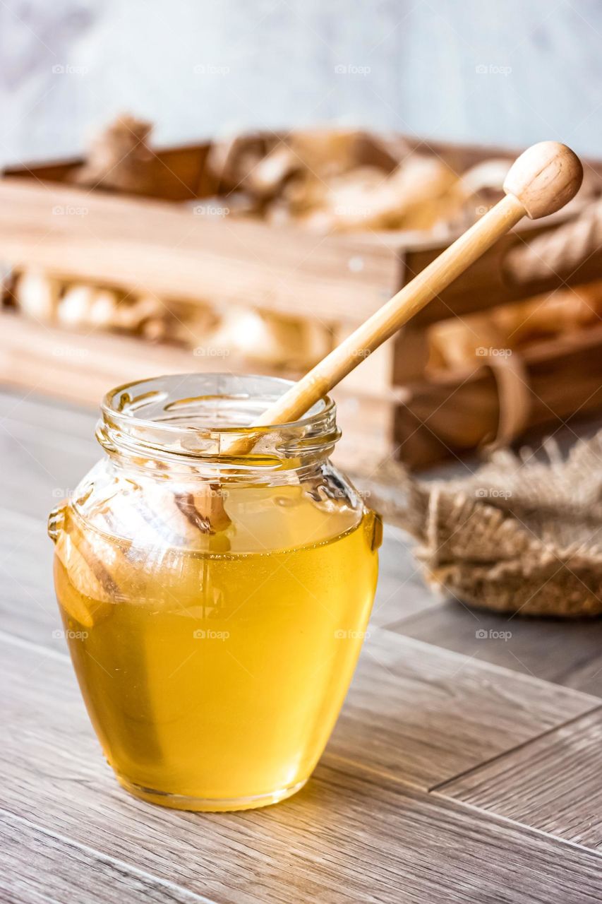 a glass jar of honey