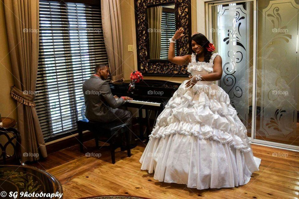 groom playing for his bride