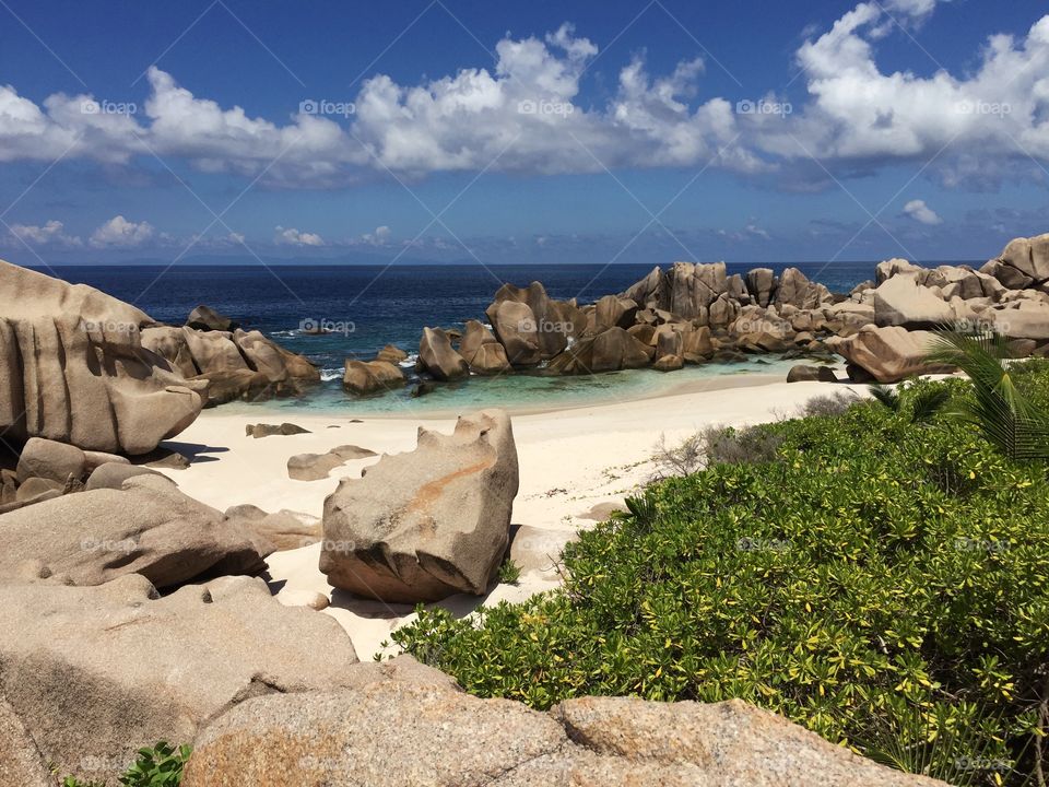 Scenic view of boulders at beach