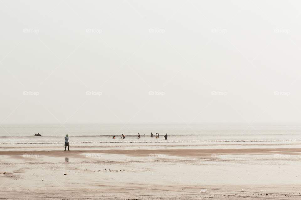 Panoramic view of Ganpatipule Sea Beach, Maharashtra. Ganpatipule has a grand shore, one of the most spectacular on Konkan coast, distinctive red sand and shallow water, making it ideal for swimming.