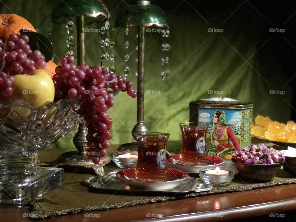 Iran has a rich culture of hospitality. Guests are welcome and considered as God's blessing. In this picture, I have tried to depict a scene called waiting for a guest. There are some items that many Iranians might find nostalgic, e.g., چای ایران.