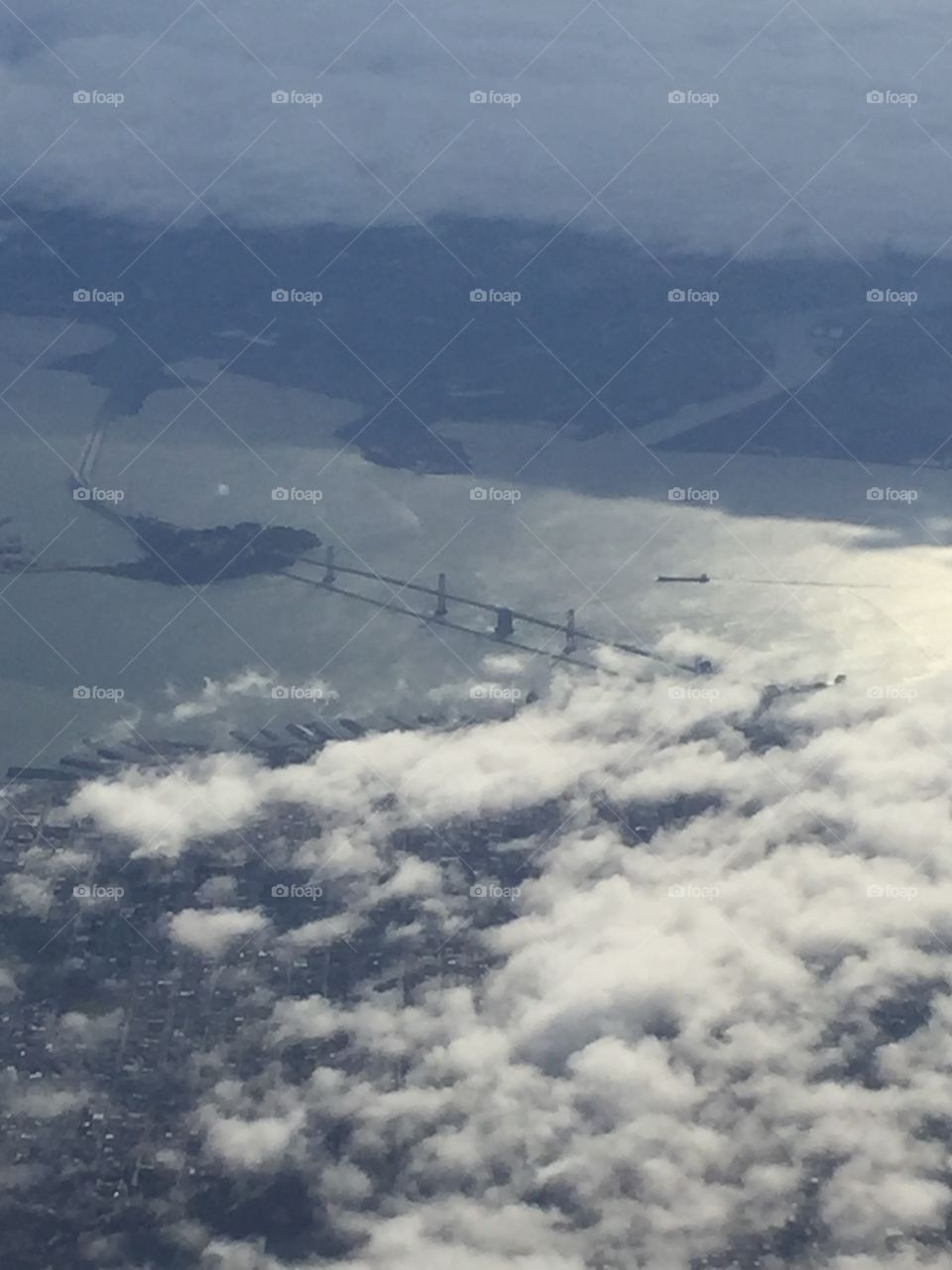 A view of The Golden Gate Bridge in San Fransisco, California- from The Plane