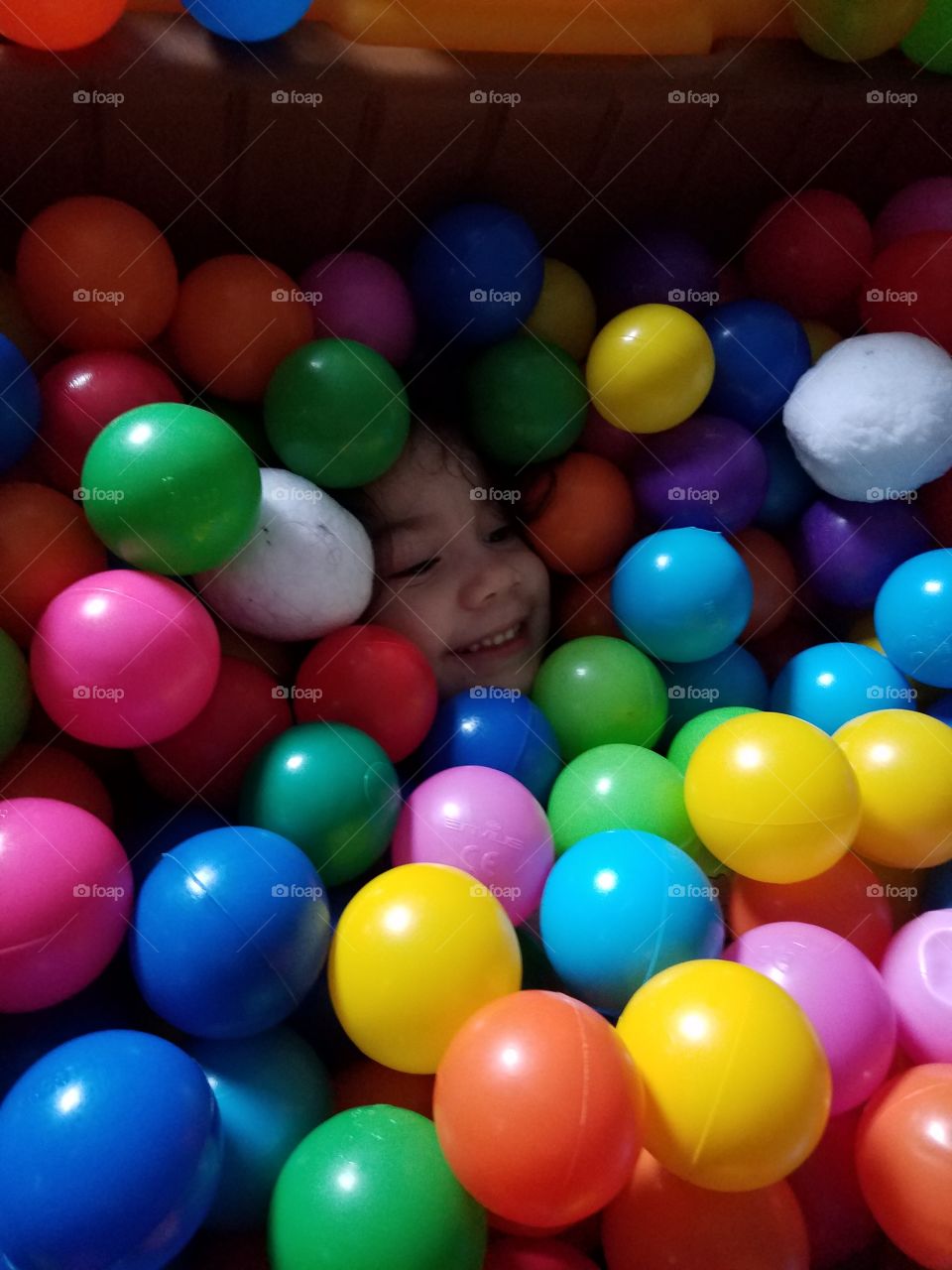 Buried in the ball pit!