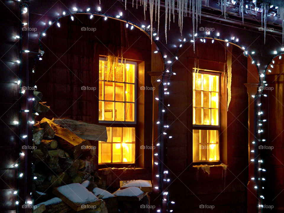 View of a warm and cozy house from outside the windows