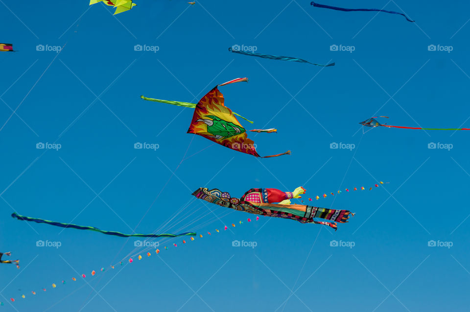 Colorful kites flying in the sky.