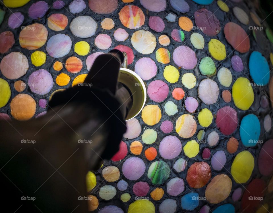 Interior of a lampshade made from circular, coloured glass set in lead