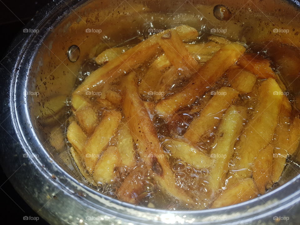 Fresh fried chips in a pan