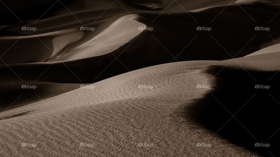 Sand dunes in desert night time