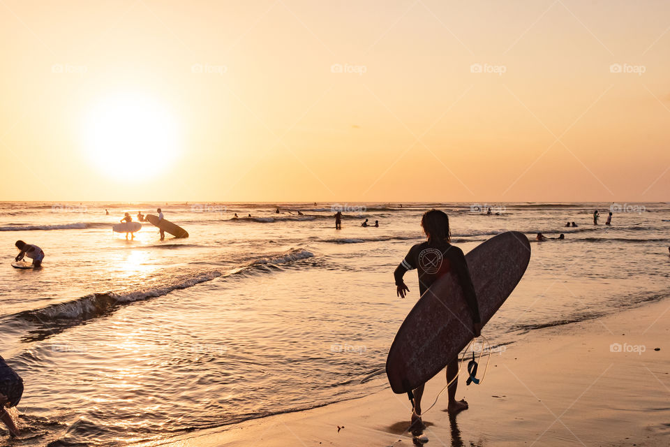 It is always good in summer, people having alot of fun during summer holiday especially on the beautiful beach of Bali, Indonesia