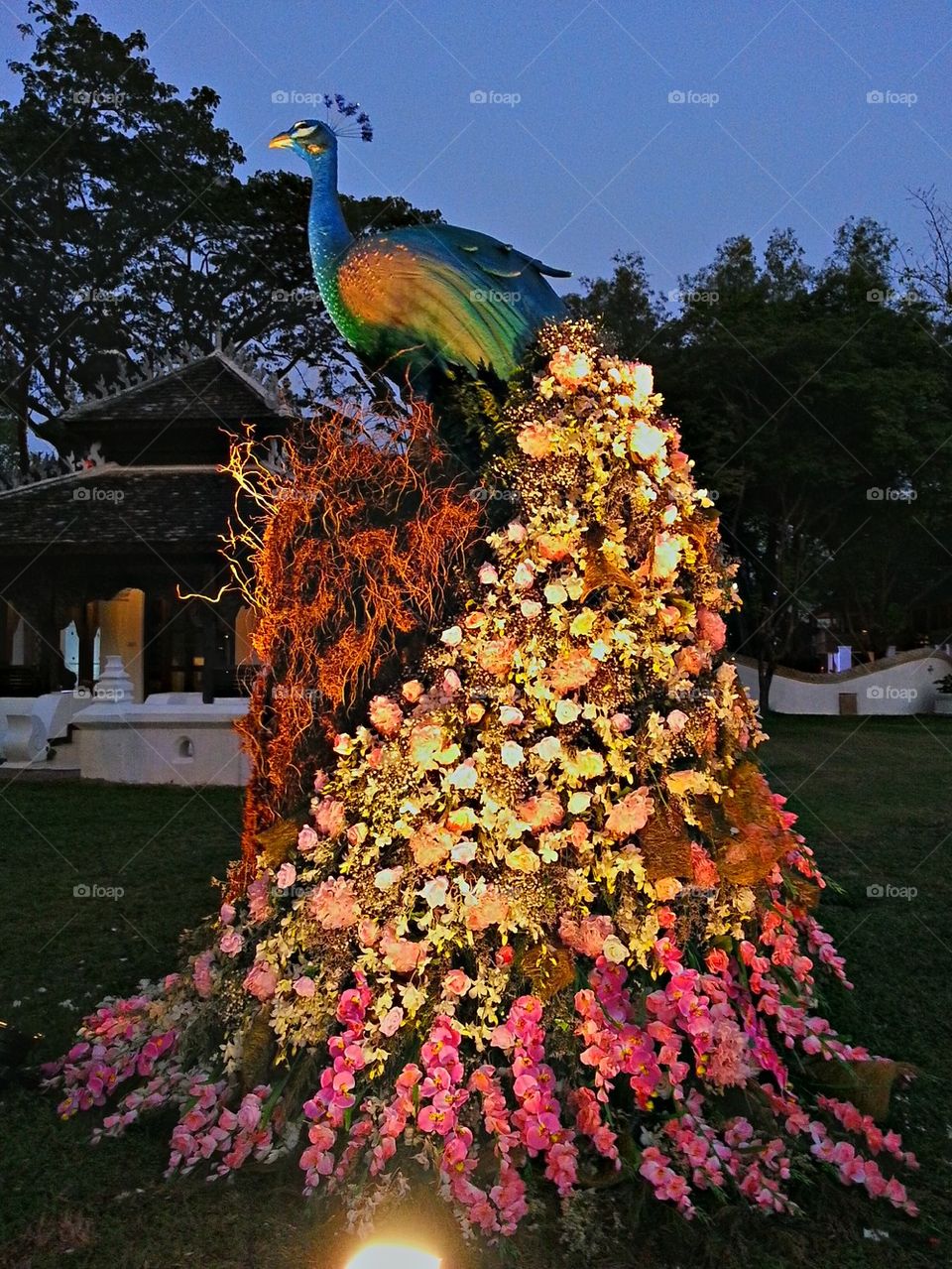 Peacock decorate from flowers at Dhara Dhevi Hotel