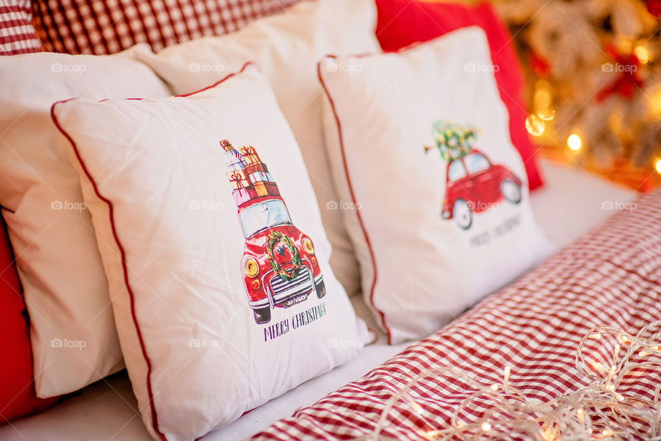 Christmas decorated pillow, festive atmosphere. Home decor.