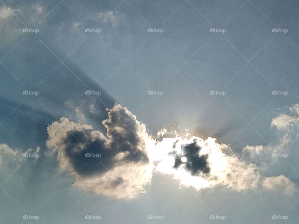 Black monster clouds with the sunshine.