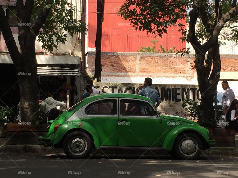 A green VW beetle in Mexico City