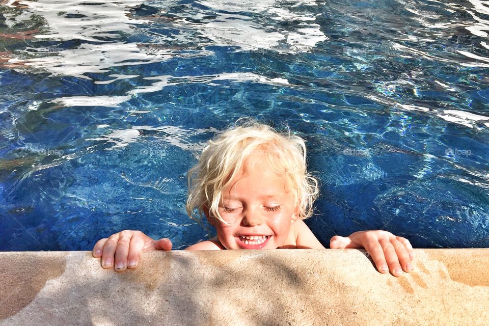Boy in a pool