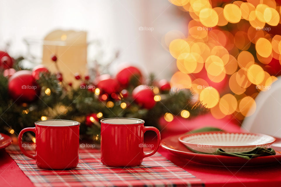 cup of coffee in a cozy festive Christmas atmosphere