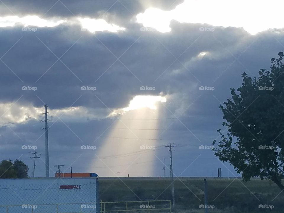 light beam from cloud