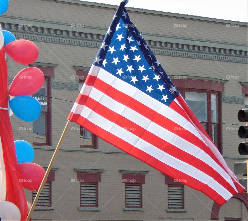 Red White and Blue, flags, pride and balloons!!  The American Pride was thick in the Kansas Streets as our colors floated aloft on the Midwestern breeze.