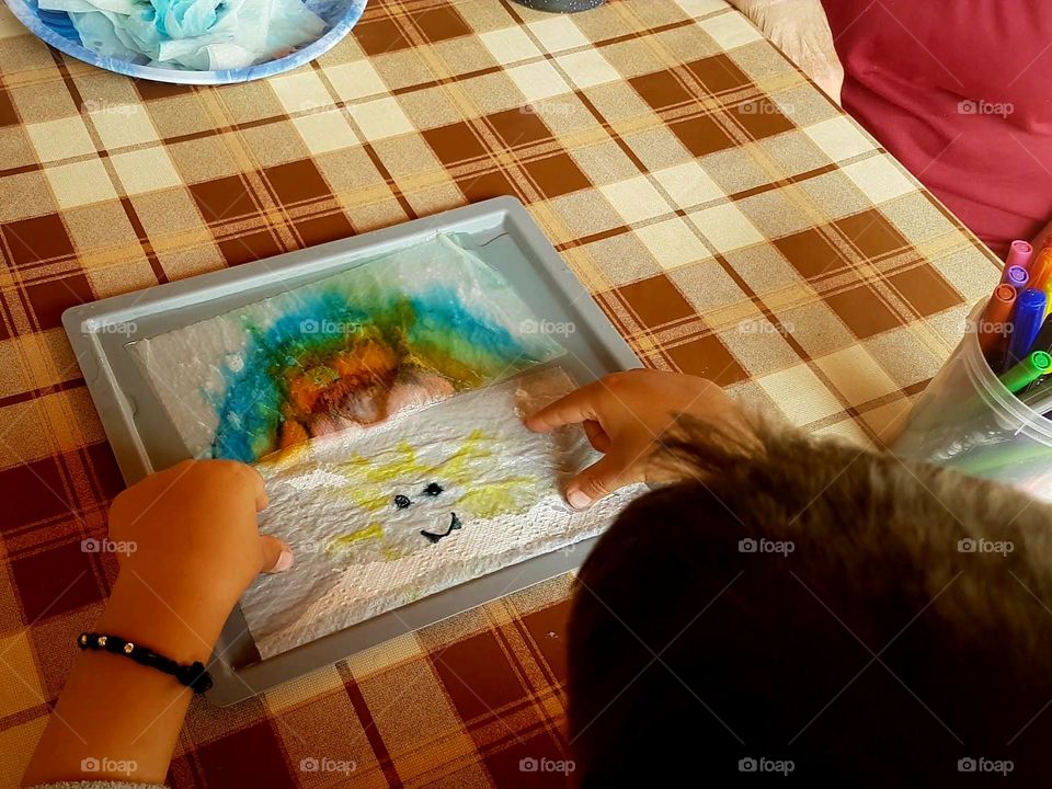 magic painting on a napkin in water