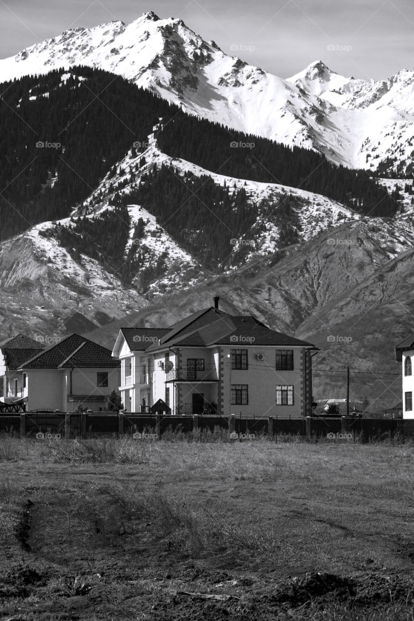 House in the background of the mountains