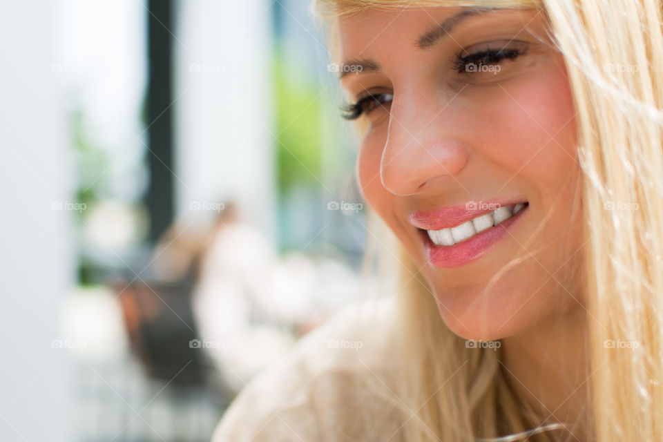 Close-up of a pretty woman smiling