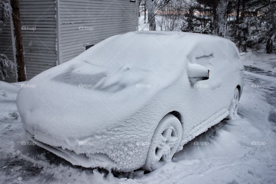 Snow blasted car