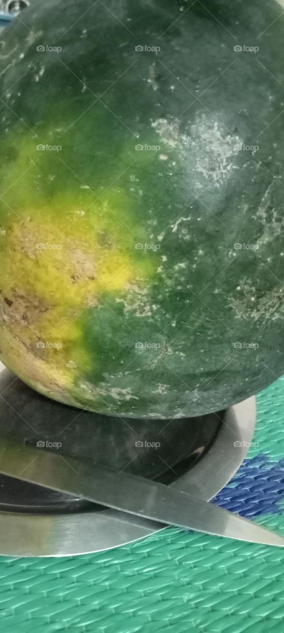 Watermelon is Attractive Red inside and outside Green colour fruit. Circle shape this fruit is very tasty. Enjoy to eat in now this summer 🌞 Very popular fruit in India. Sweet and cool this water contained fruit specially likes children's.