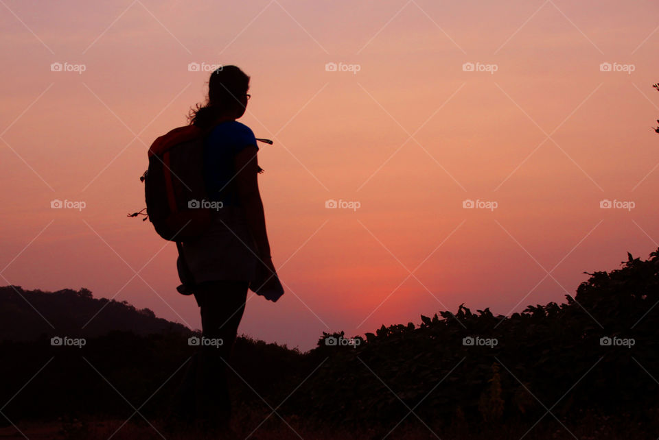 Silhouette of women travelling