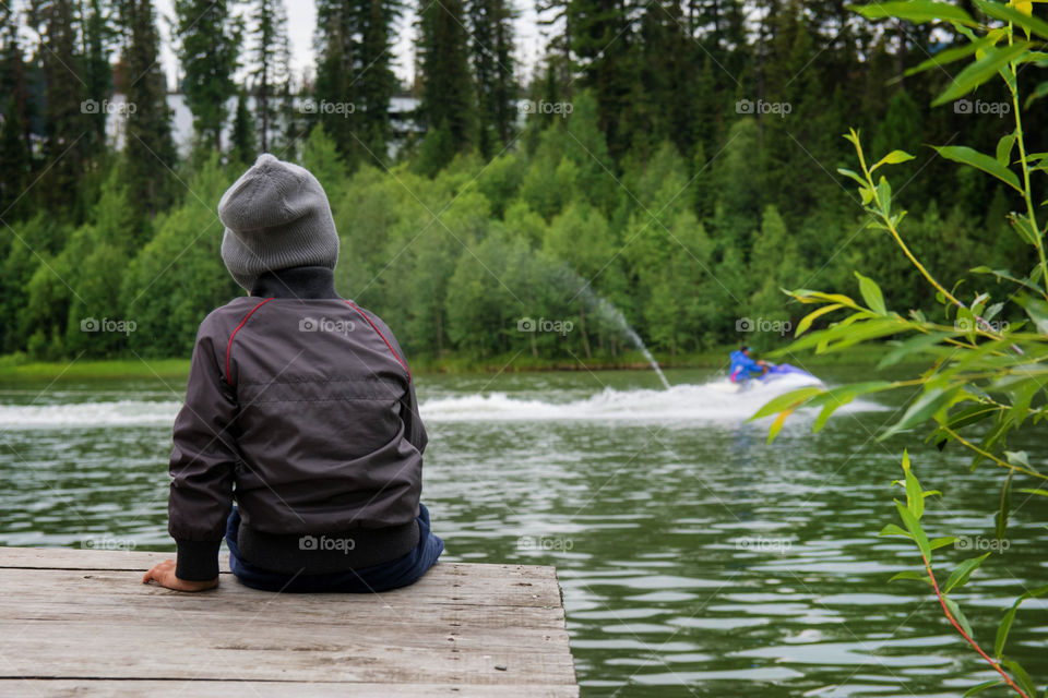 siberian water sport. kid's watching water biking