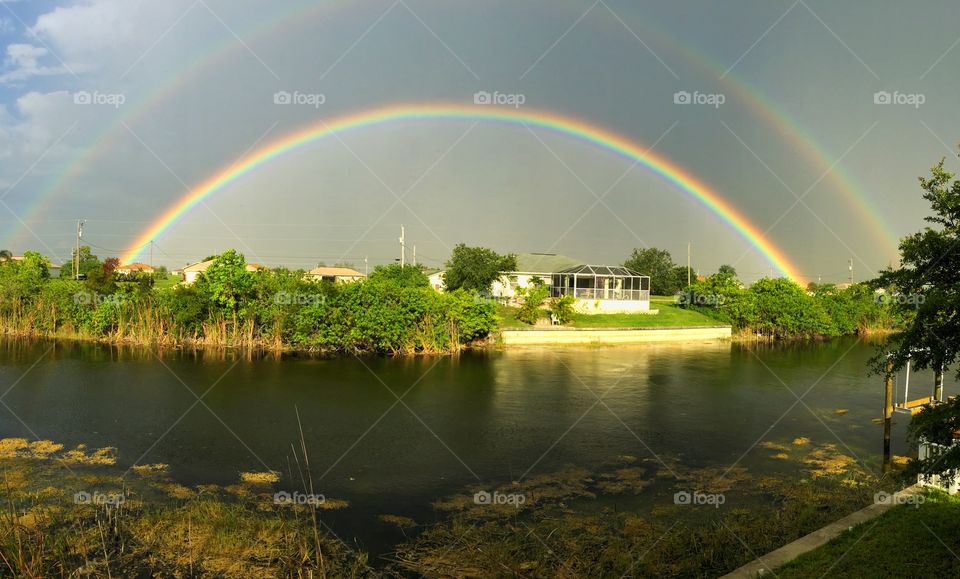 Backyard blessing . Full double rainbow in my backyard 