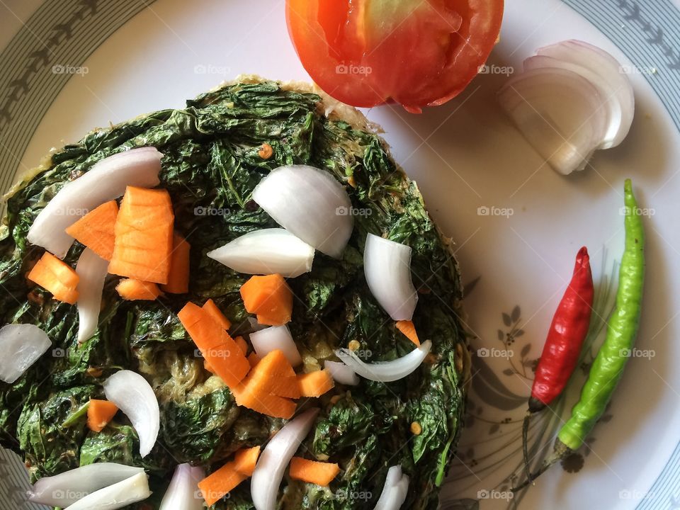 Omelette with green leafy vegetables