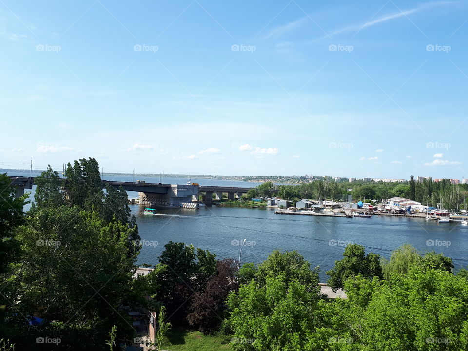 Summer landscape with bridge. River bridge