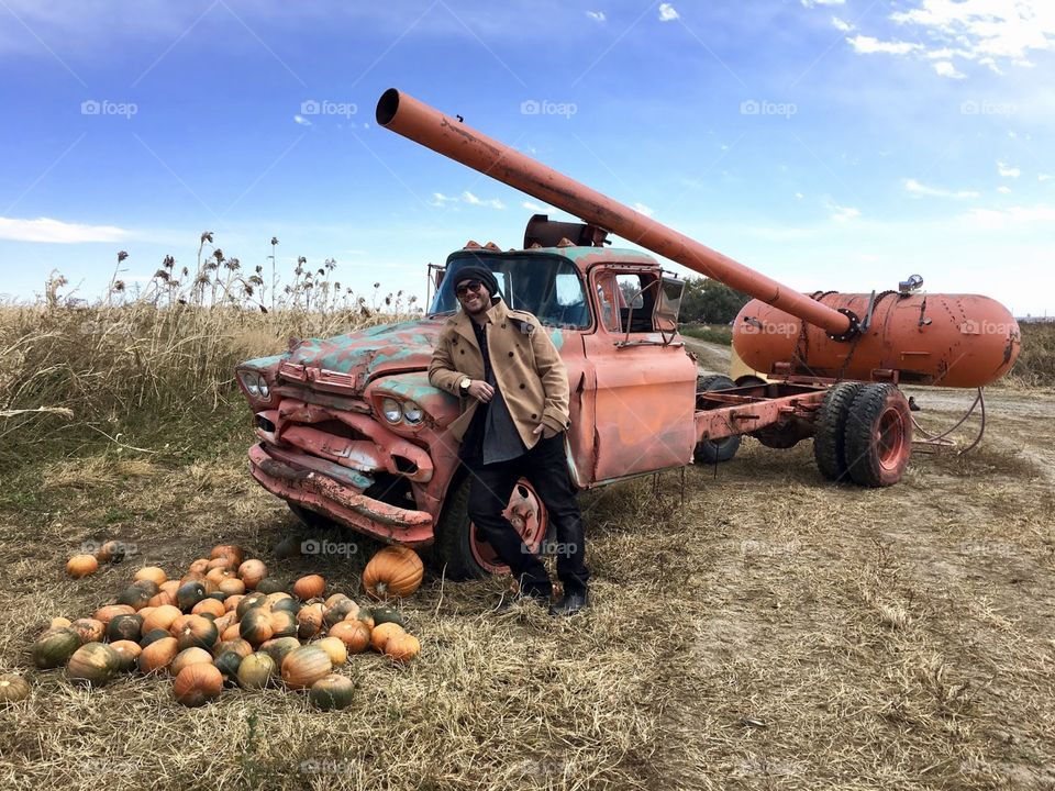 There’s no better picture of fall than pumpkins, a pick up truck, a pumpkin launcher & a fella in a peacoat 