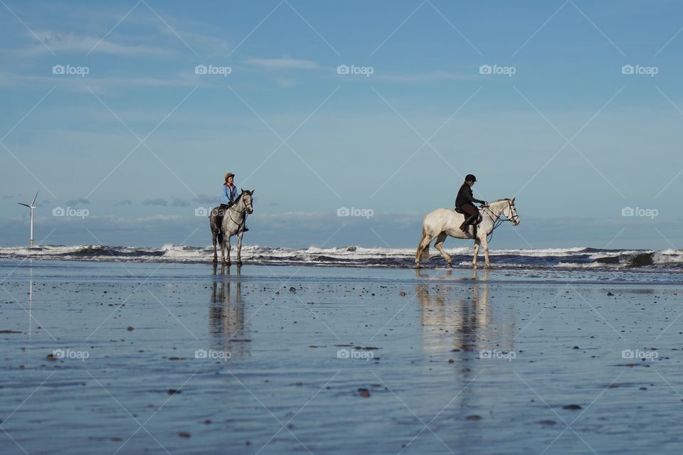 Horse riding on the beach ...