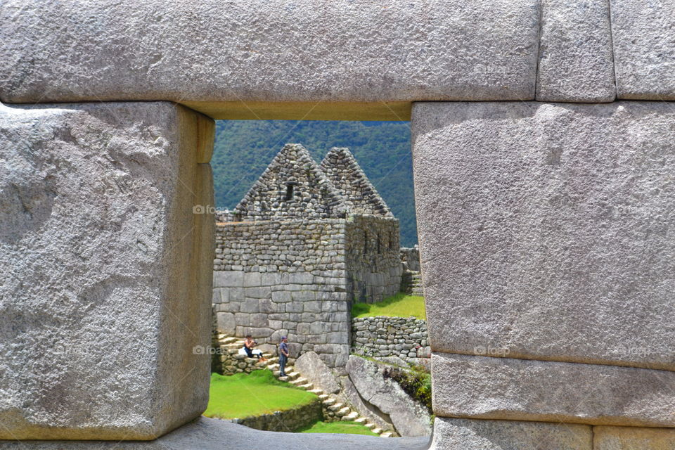 Machu Picchu Ruins. a peek through and to the ruins of Peru's Inca heritage, Machu Picchu, one of the world's 7 New Wonders