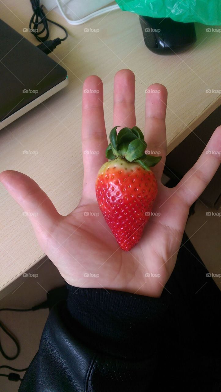 Hand strawberry