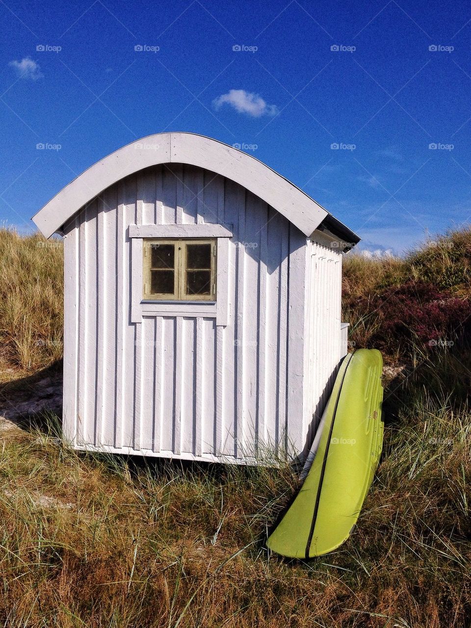 Beach hut with canoe