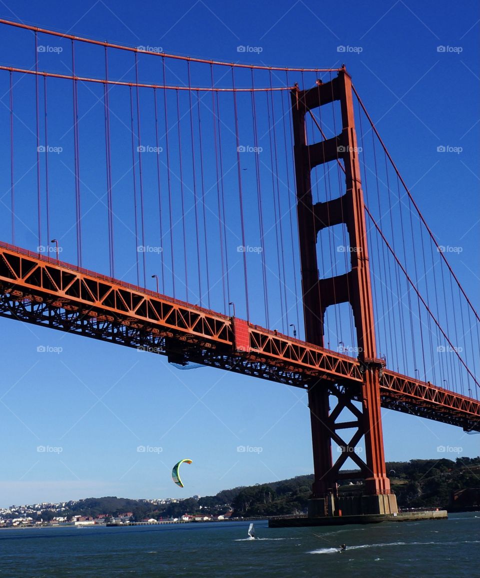Kite and wind surfing under the Golden Gate Bridge in San Francisco