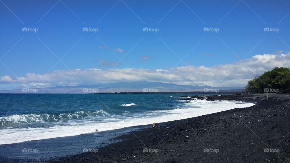 Black Sand Beach and Mountain Views