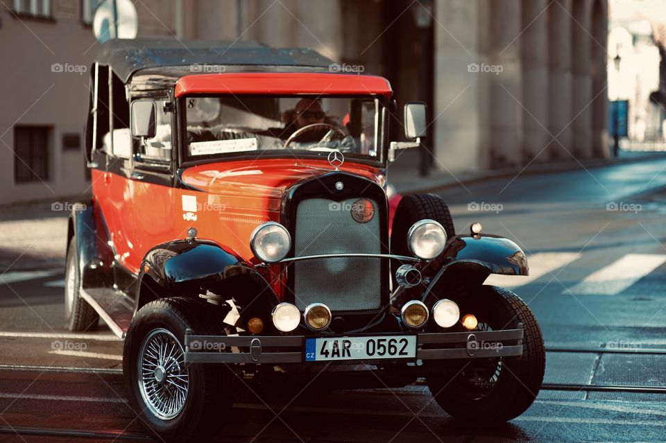 retro car for transporting tourists in prague