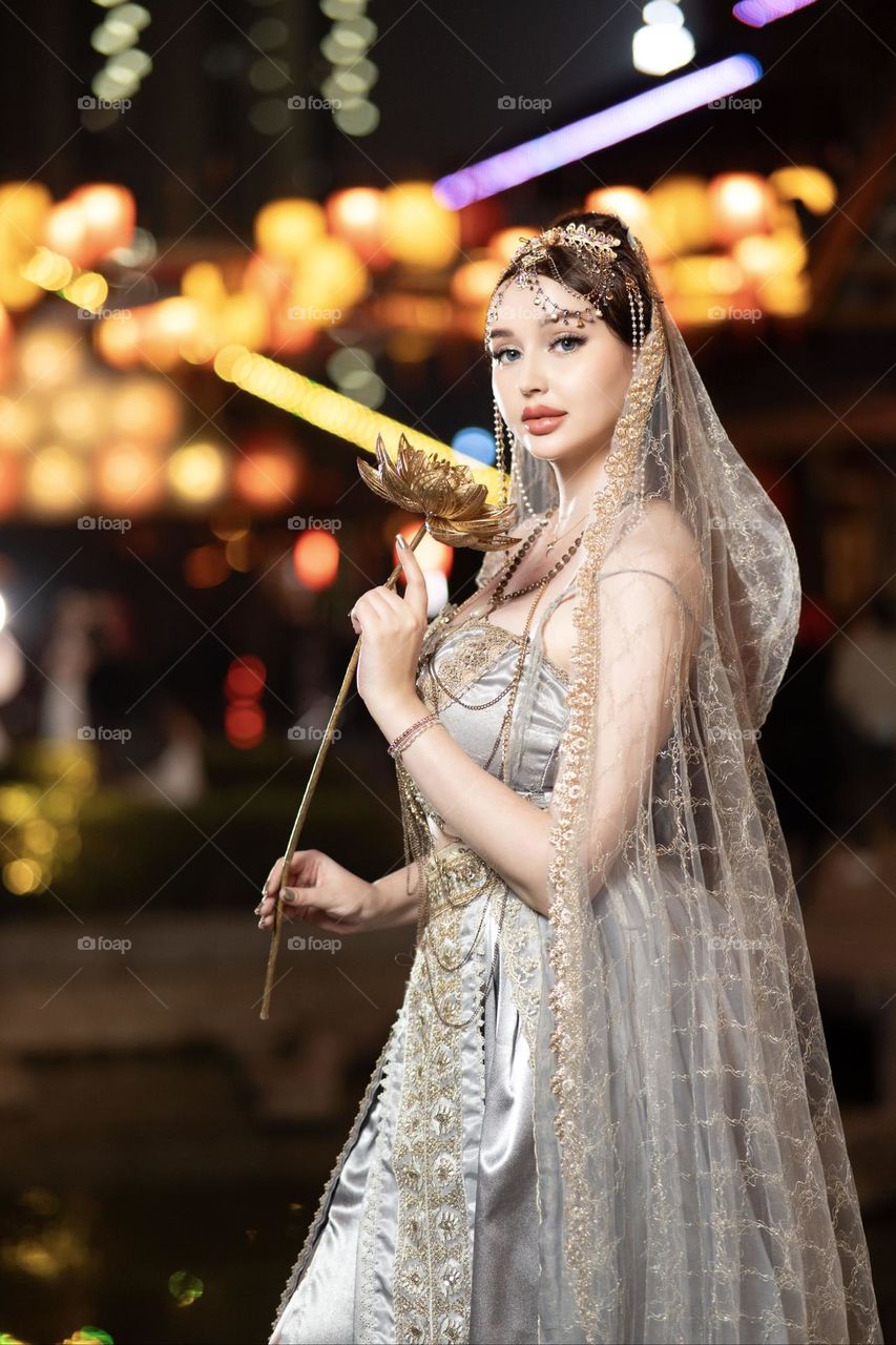 A beautiful girl in a traditional dress of the Middle East