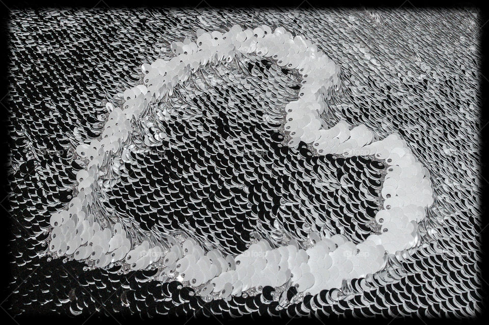 It was on that pillow she laid down her heart. For all the lace and sequins she held couldn't keep out the dark.