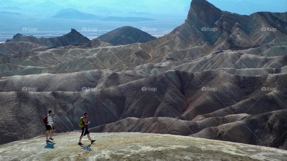 Hikers exploring Zabriskie Point in Death Valley