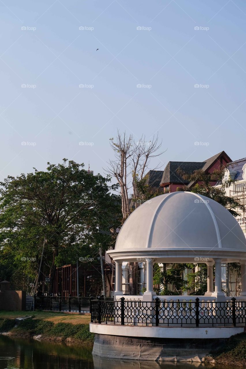 White dome in the garden at sunset