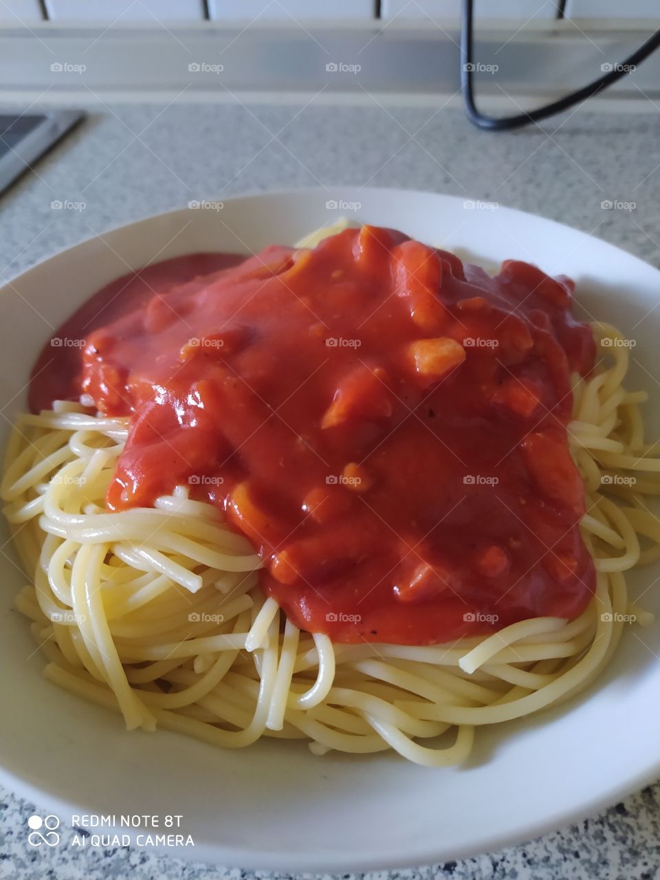 Spaghetti with tomato sauce and bacon