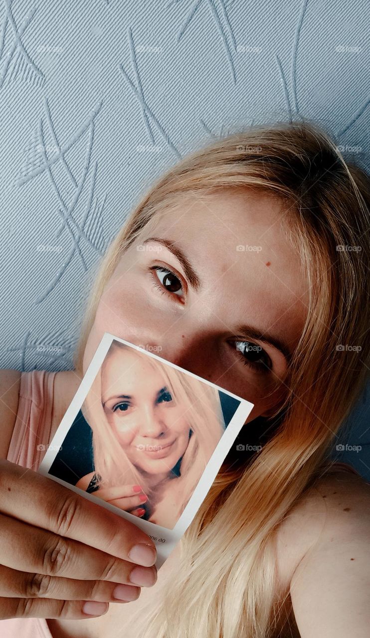 woman's face and photo of her