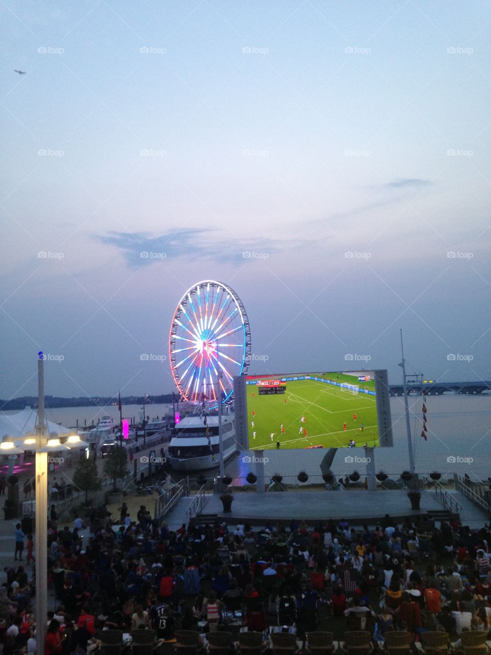 Ferris wheel . Ferris wheel at national harbor, lit up in USA's color during the women's World Cup game 