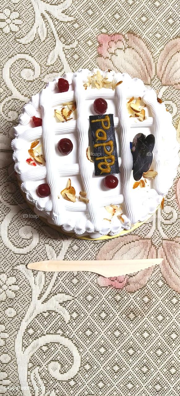 papa birthday cake it's a creamy cake with cherry toppings so testy and looks pretty